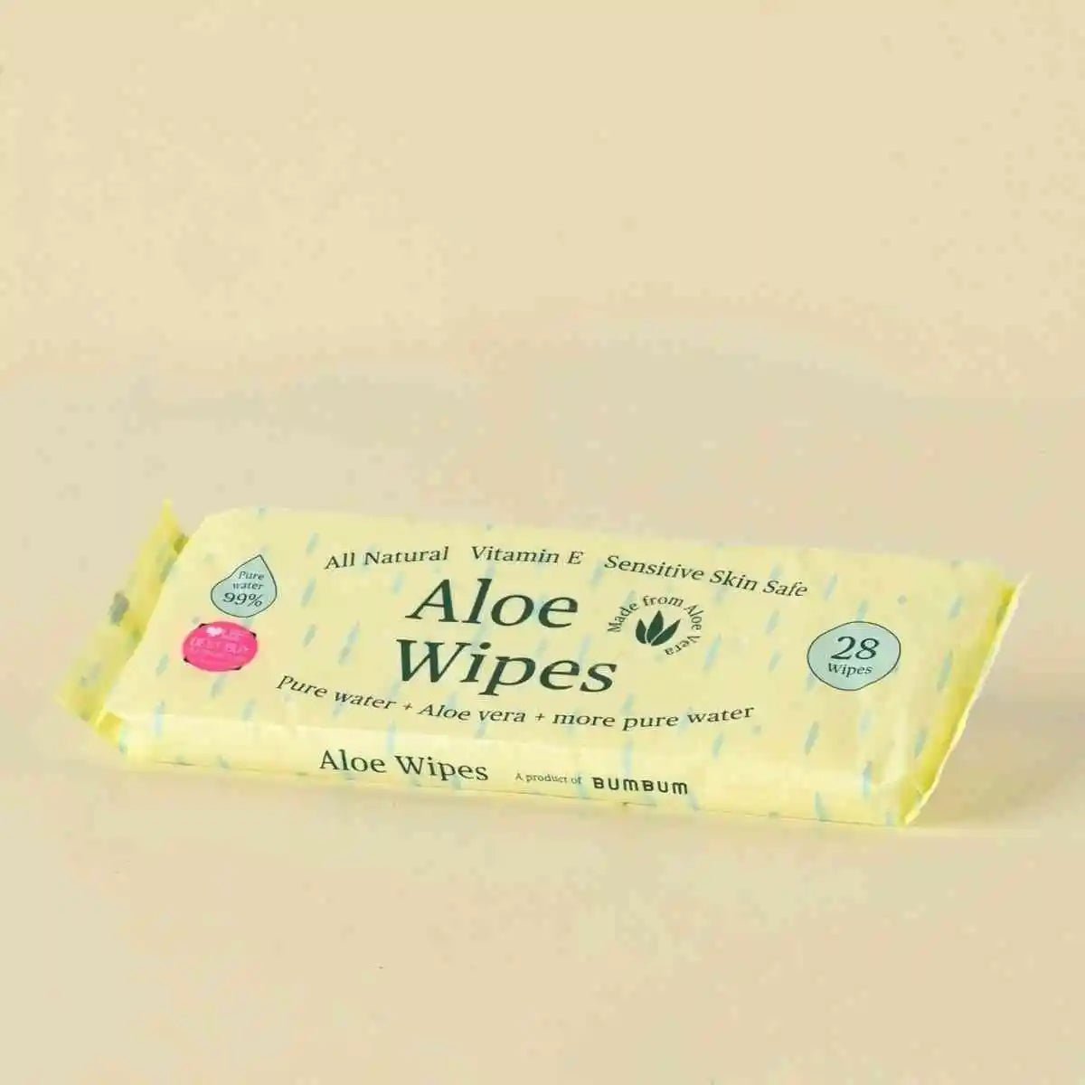 Pack of aloe wipes on a beige background
