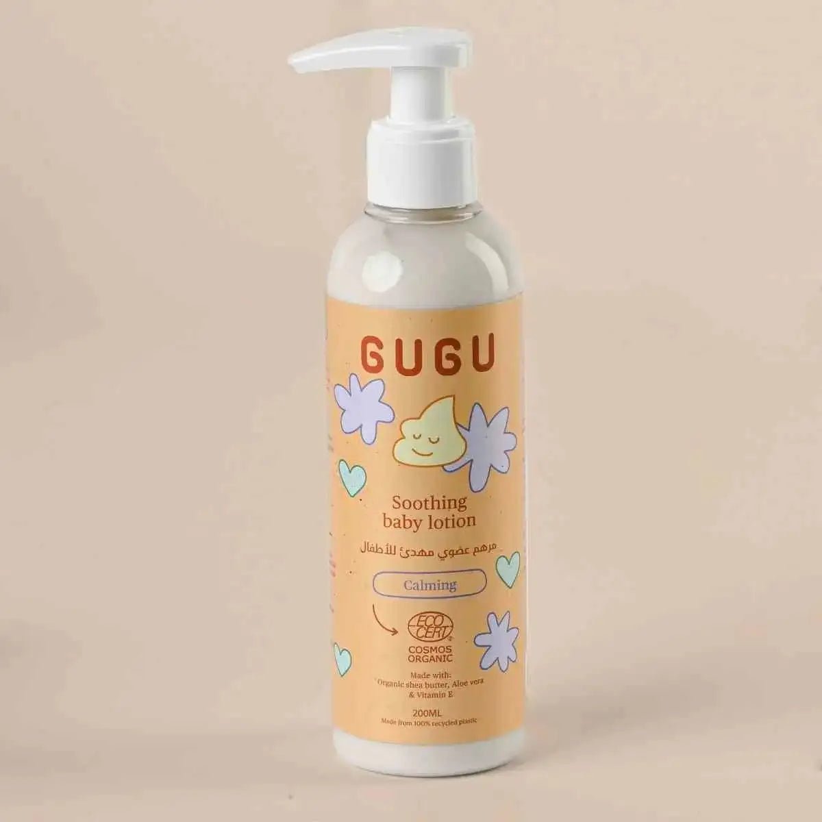 Gugu soothing baby lotion bottle on a beige background